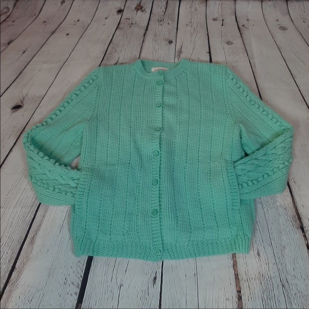 Hand made cardigan sweater with slip pockets